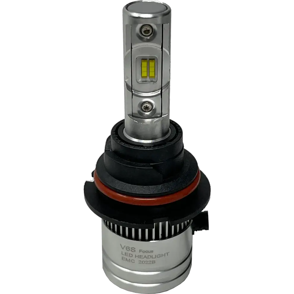 The Lumi LUMI Stage 2 9004 LED headlight bulb features a silver body and a black and red plastic base, labeled “V8S Focus LED HEADLIGHT EMC 2022B,” and is equipped with advanced CSP chips for superior brightness, displayed against a plain white background.