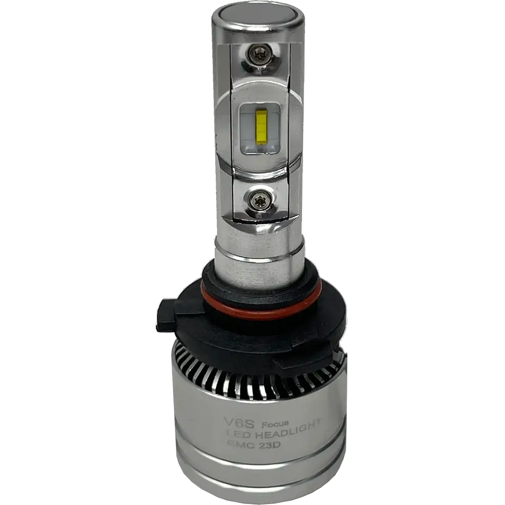 A silver LUMI Stage 2 9005 LED headlight bulb from Lumi, featuring a black and red base, finned heat sink, and a visible diode in the center marked ‘V6S Focus LED Headlight EMC 23D.’ This model utilizes high-performance CSP chips to provide a crisp 6000K color temperature for enhanced visibility.