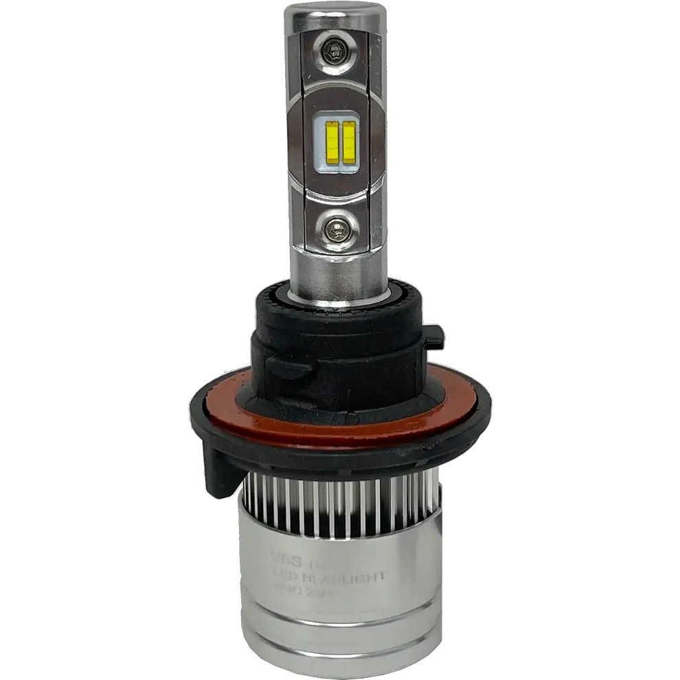 A close-up of a Lumi Stage 2 H13 LED headlight bulb highlights its silver base, black and orange ring, and two yellow CSP chips on the rectangular metal shaft, showcasing the advanced technology of modern 6000K bulbs from Lumi.