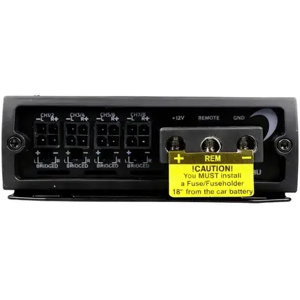 The rear panel of the Diamond Audio MICRO88U 8-Channel Full Range Class D Amplifier by Diamond Audio features multiple channel inputs and outputs, an 8-channel amplifier design, and a caution label advising installation of a fuse or fuse holder within 18 inches of the car battery on the power connection terminal.