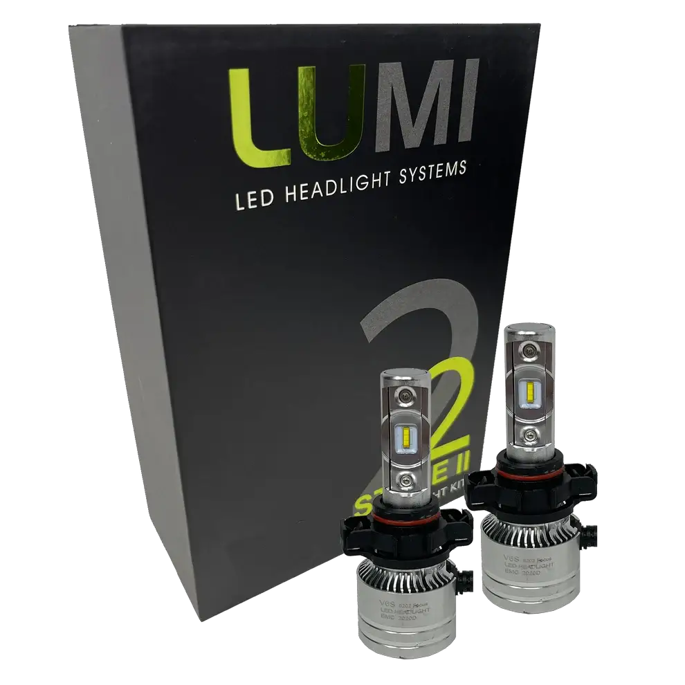 Two LUMI Stage 2 5202 LED Headlight Bulbs from Lumi are shown in front of a black box labeled “LUMI LED Headlight Systems Stage II Smart Kit” on a plain background, delivering powerful 6000K illumination.