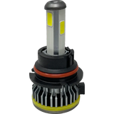 A close-up of a LUMI Stage 1 9004 LED Headlight Bulb by Lumi, featuring a 40 Watt output, metallic base, yellow LED panels, black and silver heat sink, and an orange rubber sealing ring, set against a plain white background. This 6000K CANBUS bulb delivers both style and optimal performance.