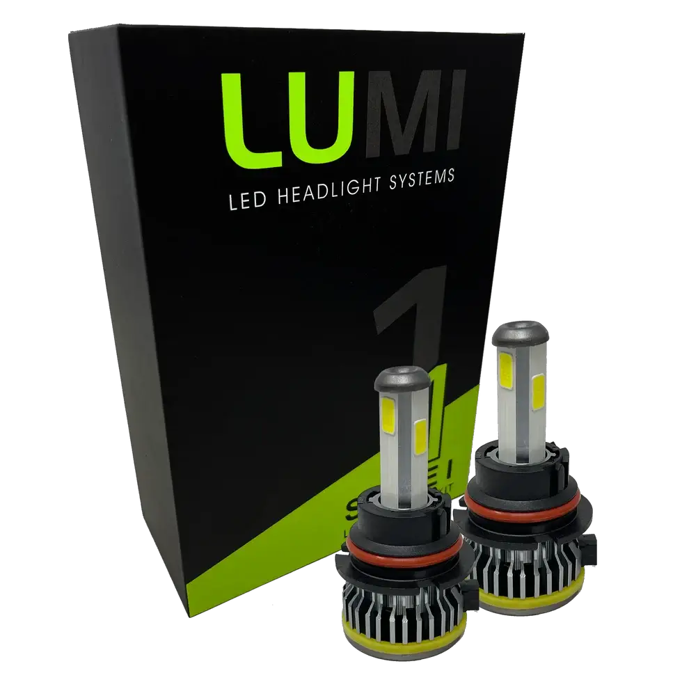 Two LUMI Stage 1 9004 LED Headlight Bulbs from Lumi are displayed in front of a black and green Lumi LED Headlight Systems box on a white background, showcasing their 40 Watt performance and seamless compatibility with LED CANBUS systems.