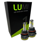 Two LUMI Stage 1 9004 LED Headlight Bulbs from Lumi are displayed in front of a black and green Lumi LED Headlight Systems box on a white background, showcasing their 40 Watt performance and seamless compatibility with LED CANBUS systems.