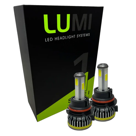 Two LUMI Stage 1 9004 LED Headlight Bulbs from Lumi are displayed in front of a black and green Lumi LED Headlight Systems box on a white background, showcasing their 40 Watt performance and seamless compatibility with LED CANBUS systems.