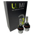 Two LUMI Stage 2 9004 LED Headlight Bulbs by Lumi are displayed in front of a black box labeled “LUMI LED Headlight Systems 2.” The bulbs have a metallic finish with prominent yellow CSP chips, delivering bright 6000K light for enhanced visibility.