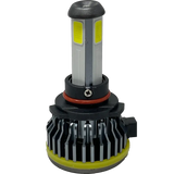 A close-up of a Lumi LUMI Stage 1 9005 LED Headlight Bulb, featuring yellow panels, black heatsink fins at the base, and a small connector on the side, isolated on a white background.