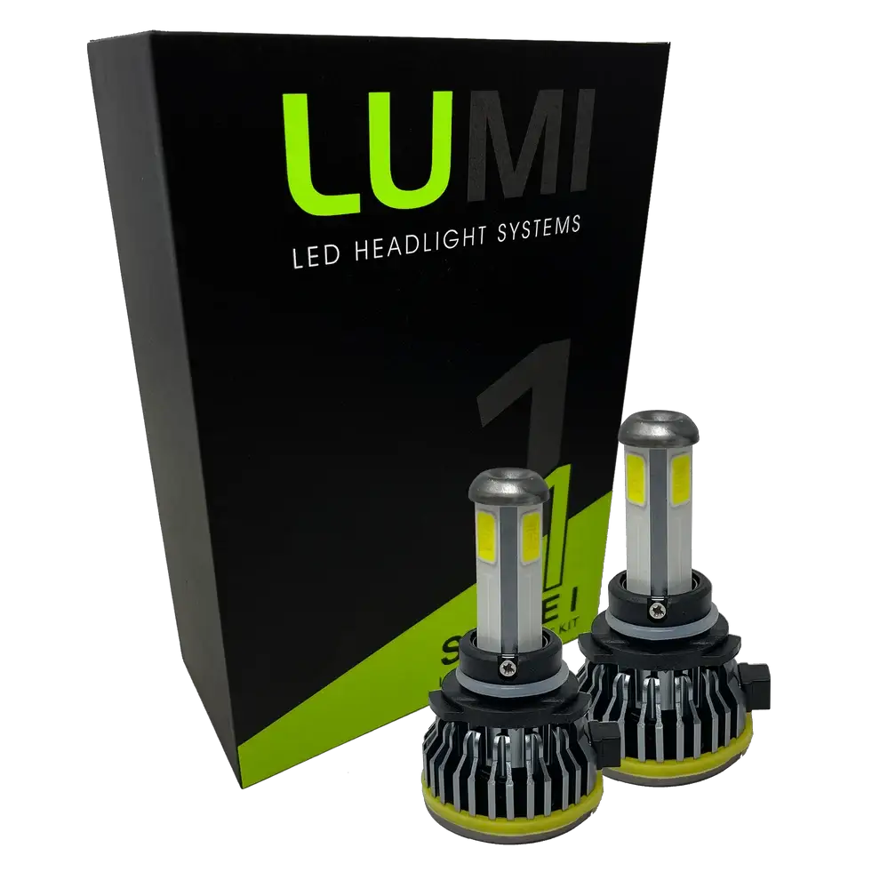 Two LUMI Stage 1 9006 LED Headlight Bulbs are displayed in front of a black and green Lumi box on a white background.