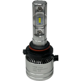 Introducing the LUMI Stage 2 9007 LED Headlight Bulbs by Lumi: Featuring a silver design with integrated cooling fins, a black and red gasket at the base, and visible CSP chips on the front for improved brightness. The bulbs include a black connector attached at the bottom, and “V6S Focus LED HEADLIGHT EMC 21F” printed on the base. These Lumi headlights emit a crisp 6000K white light, delivering superior visibility for nighttime driving.