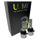Two LUMI Stage 2 9007 LED Headlight Bulbs from Lumi, featuring advanced CSP chips and a crisp 6000K color temperature, are displayed in front of a black box labeled LUMI LED Headlight Systems 2 Series II Headlight Kit.