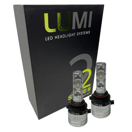 Two LUMI Stage 2 9007 LED Headlight Bulbs from Lumi, featuring advanced CSP chips and a crisp 6000K color temperature, are displayed in front of a black box labeled LUMI LED Headlight Systems 2 Series II Headlight Kit.