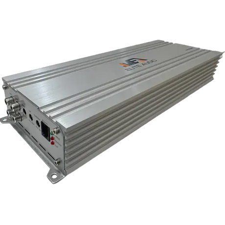 The Elite Audio EA4000M is a silver, rectangular monoblock car amplifier with ribbed sides and the Elite Audio logo displayed prominently on top. Designed for competition-level performance, it features advanced high-speed MOSFET circuitry to ensure powerful and clear audio output. The front panel includes various input and output ports, control switches, and LED indicators. The amplifier is shown photographed against a white background.
