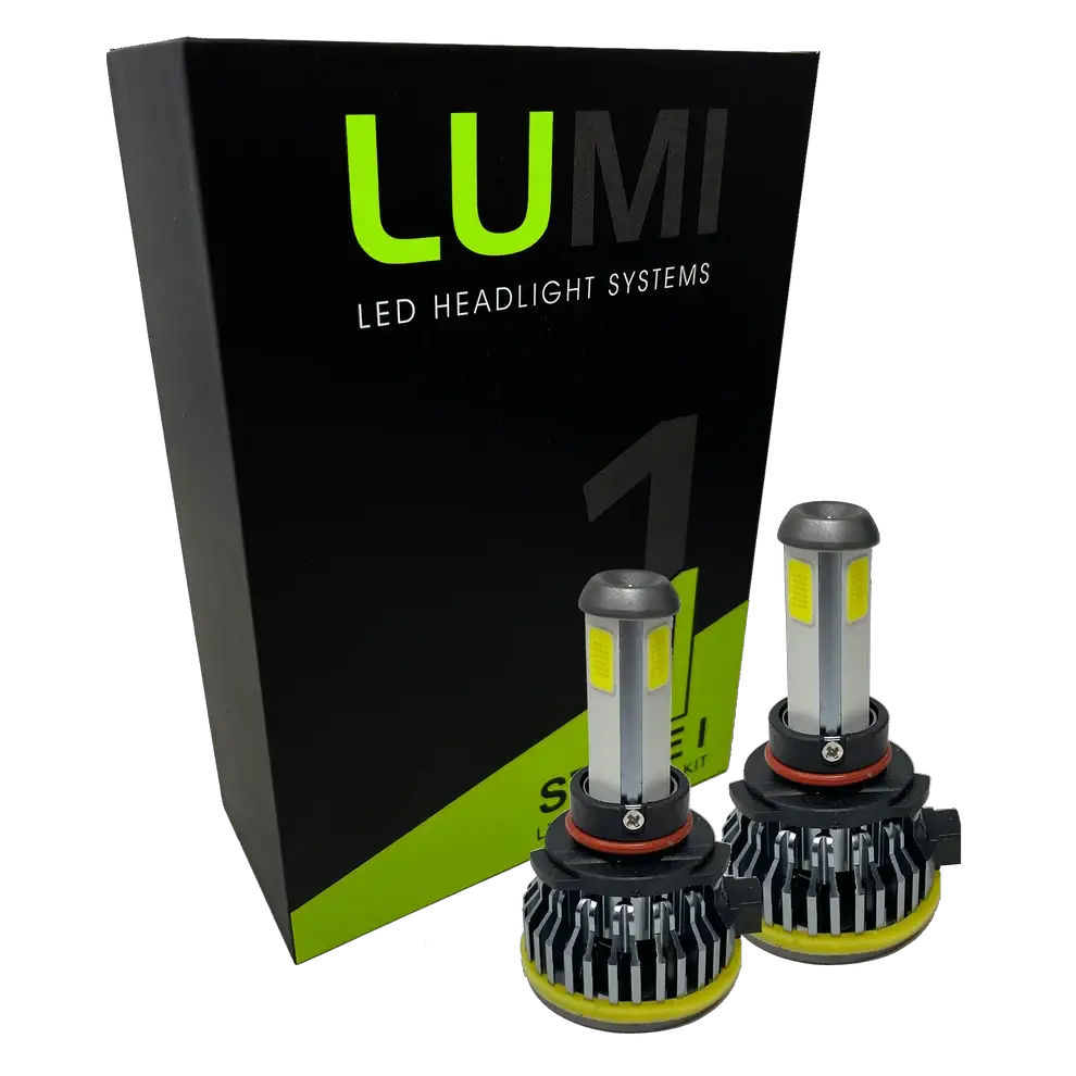 Two high-performance Lumi Stage 1 H10 LED Headlight Bulbs, each delivering a powerful 6000K light at 40 Watts, are displayed in front of a sleek black and green Lumi LED Headlight Systems box with bold text. These bulbs also feature integrated LED CANBUS technology for optimal compatibility.
