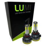 Two high-performance Lumi Stage 1 H10 LED Headlight Bulbs, each delivering a powerful 6000K light at 40 Watts, are displayed in front of a sleek black and green Lumi LED Headlight Systems box with bold text. These bulbs also feature integrated LED CANBUS technology for optimal compatibility.