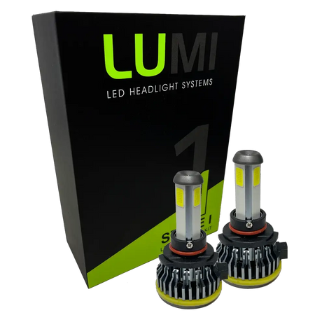 Two high-performance Lumi Stage 1 H10 LED Headlight Bulbs, each delivering a powerful 6000K light at 40 Watts, are displayed in front of a sleek black and green Lumi LED Headlight Systems box with bold text. These bulbs also feature integrated LED CANBUS technology for optimal compatibility.