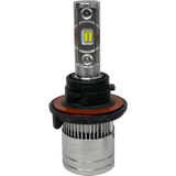 A close-up of a Lumi Stage 2 H13 LED headlight bulb highlights its silver base, black and orange ring, and two yellow CSP chips on the rectangular metal shaft, showcasing the advanced technology of modern 6000K bulbs from Lumi.