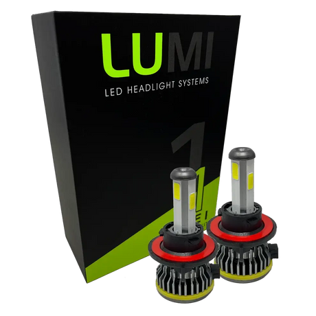 Two LUMI Stage 1 H13 LED headlight bulbs from Lumi, each rated at 40 Watts and featuring red and black heat sinks, are displayed in front of a black and green box labeled “LUMI LED Headlight Systems.” These bulbs offer a bright 6000K color temperature and include advanced LED CANBUS technology for enhanced compatibility.