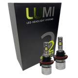 Two LUMI Stage 2 H13 LED Headlight Bulbs by Lumi, featuring advanced CSP chips, are displayed in front of a black box labeled “LUMI LED Headlight Systems 2 Stage II Series Kit.”.