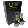 Two premium LUMI Stage 2 H3 LED Headlight Bulbs with advanced CSP chips are positioned in front of a sleek black Lumi LED Headlight Systems box labeled Stage 2, delivering brilliant 6000K color temperature illumination.