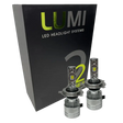 Two LUMI Stage 2 H4 LED Headlight Bulbs with advanced CSP chips are displayed in front of a black Lumi LED Headlight Systems box featuring green and white text, highlighting their brilliant 6000K illumination.