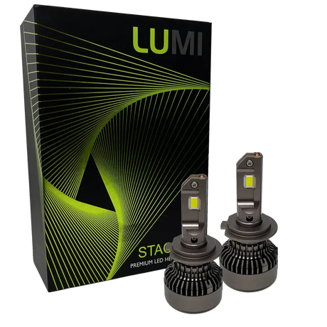 Two Lumi Stage 3 H7 LED headlight bulbs, equipped with advanced CSP chips and offering a bright 6000K color temperature, are displayed in front of a black box accented with green lines and the LUMI logo. The packaging also features the text “STACK” and “Premium LED Headlights.”.