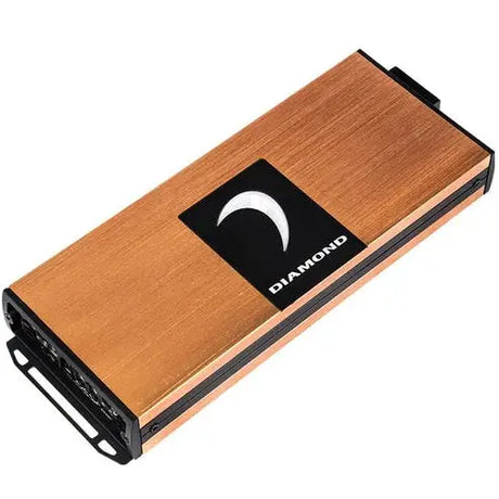 A rectangular, copper-colored electronic device with black edges featuring a crescent moon symbol and the word “DIAMOND” on a black label—this is the Diamond Audio MICRO5V2 5-Channel Full Range Class D Amplifier by Diamond Audio, engineered for powerful and optimal audio performance.