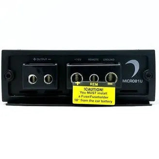Close-up of the rear panel of a Diamond Audio MICRO81U Monoblock Class D Subwoofer Amplifier, displaying its power and output terminals. A yellow caution label from Diamond Audio advises installing a fuse holder 18 inches from the car battery.